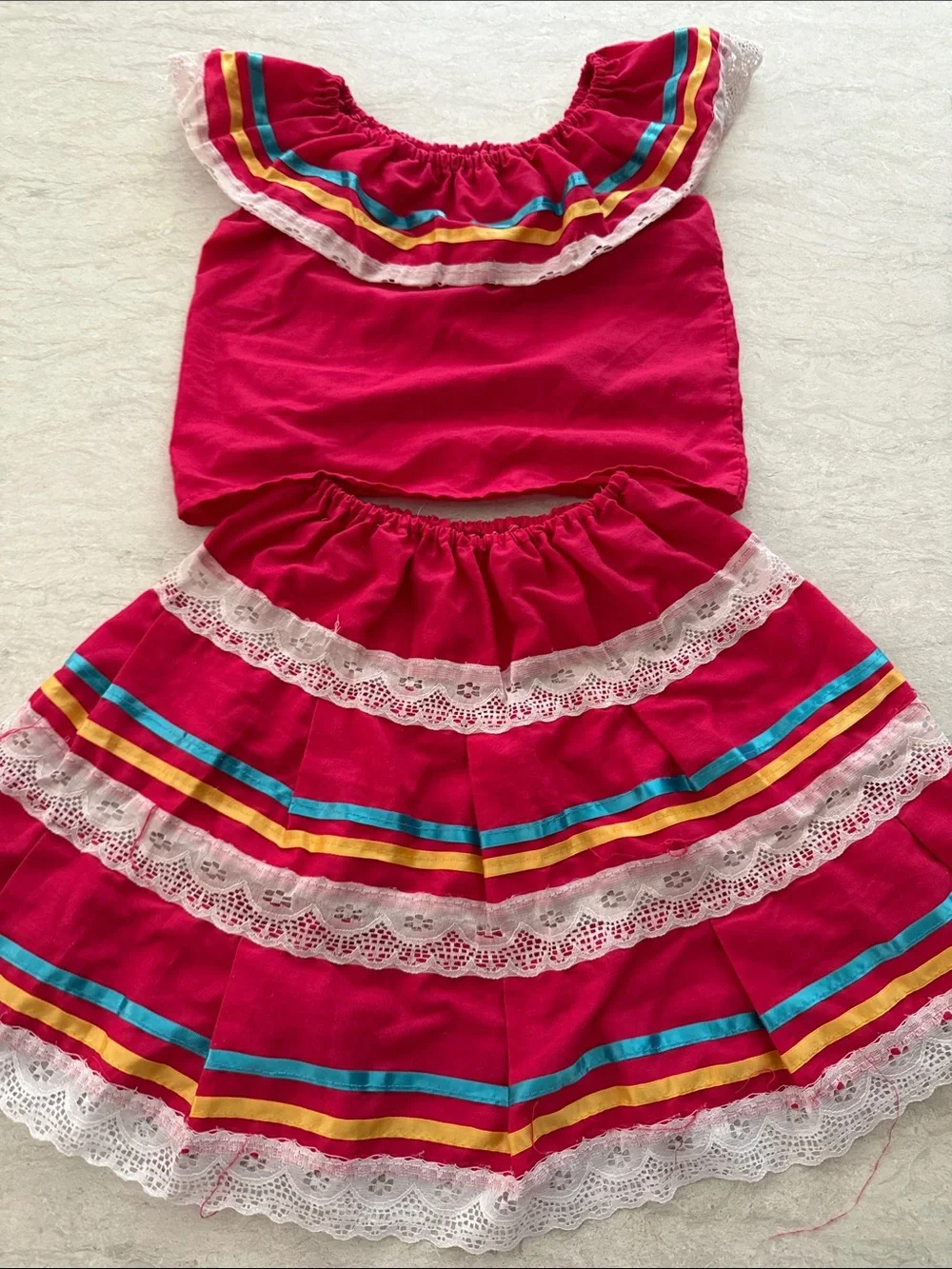 Latin American Bright Fuchsia Two-Piece Girl’s Outfit with Rainbow Trim